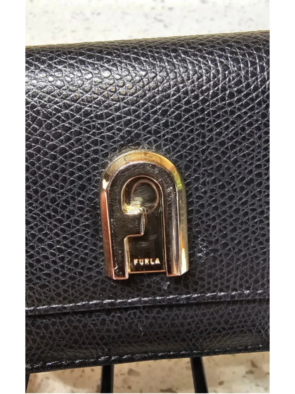 Compact Tri-Fold Black Furla Wallet with Gold hardware